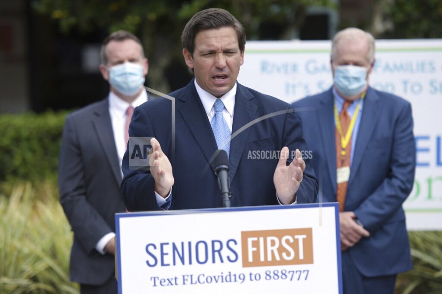 Florida Governor Ron DeSantis addressed the media at the River Garden Hebrew House for the Aged in Jacksonville, Fla., on the status of COVID-19 vaccination rates in the states nursing homes and assisted living facilities Monday, Jan. 25, 2021. (Bob Self/The Florida Times-Union via AP)