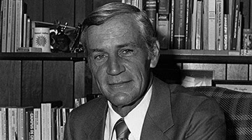 President Thomas Carpenter at his desk.