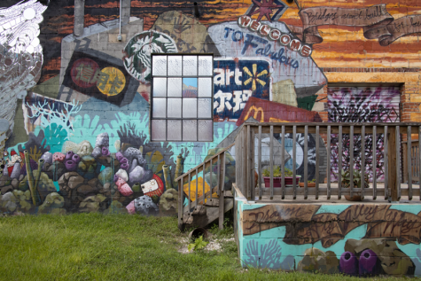 Photo from Brody’s series “Public Domain” - Welcome to Fabulous Art (Mural collaboration by Dustin Harewood, Elena Ohlander and Shaun Thurston; mirror mosaic by Christy Frazier, Jacksonville, FL), 2020, Archival Inkjet Print / Image courtesy of Ally Brody