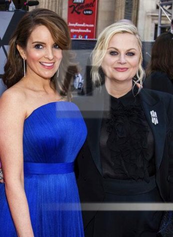 Hosts Amy Poehler and Tina Fey, Photo by Charles Sykes/Invision/AP