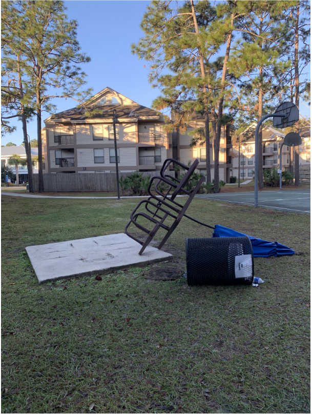 Photo of a knocked over picnic table / Photo courtesy of UPD