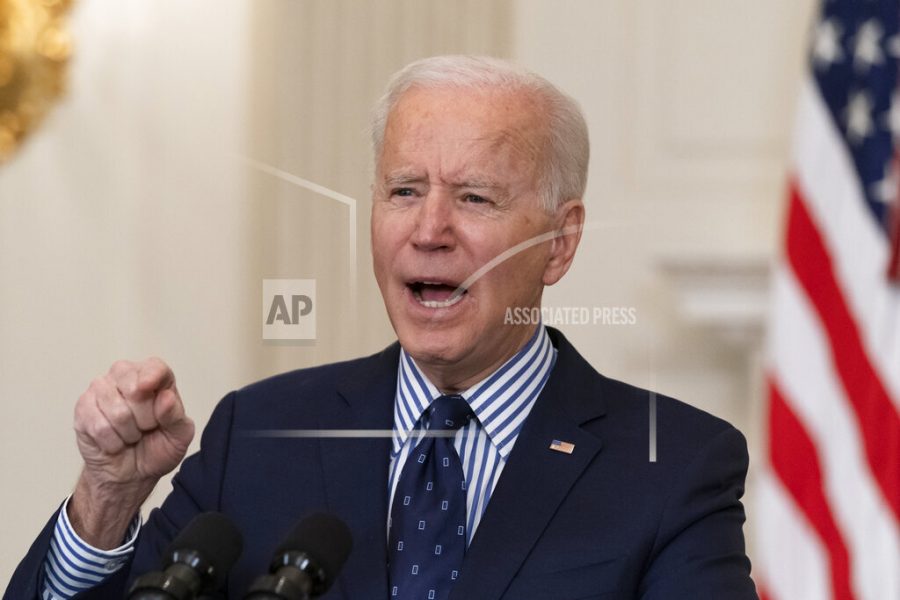 President Joe Biden speaks in the State Dining Room of the White House, Saturday, March 6, 2021, in Washington. (AP Photo/Alex Brandon)