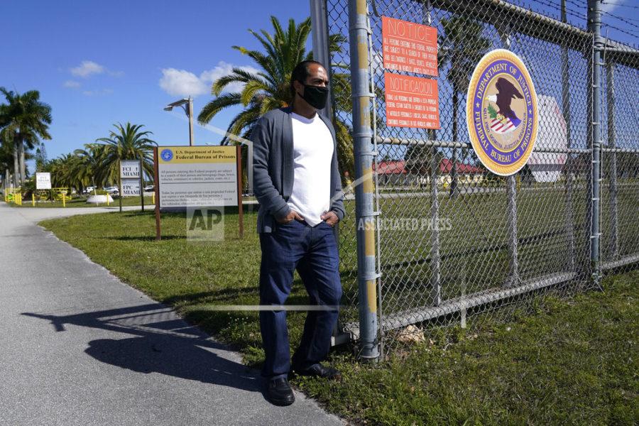 Kareen Troitino stands outside the Federal Corrections Institution, Friday, March 12, 2021, in Miami. Troitino, a local corrections officer union president, said that fewer than half of the facilitys 240 employees have been fully vaccinated as of March 11. Many of the workers who refused had expressed concerns about the vaccine’s efficacy and side effects, Troitino said. (AP Photo/Marta Lavandier)