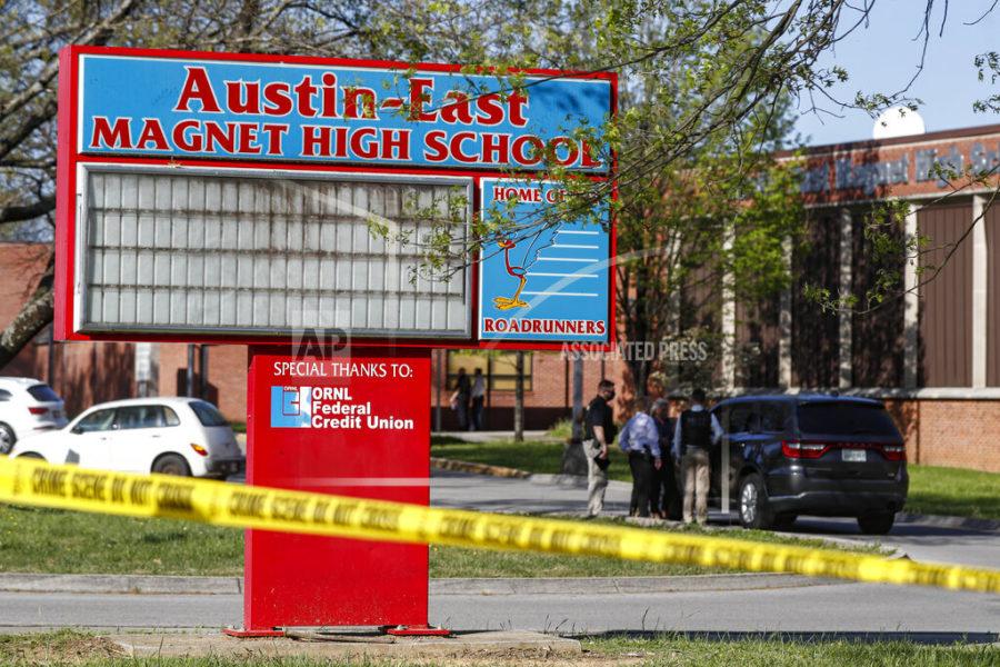 Knoxville police work the scene of a shooting at Austin-East Magnet High School Monday, April 12, 2021, in Knoxville, Tenn. (AP Photo/Wade Payne)