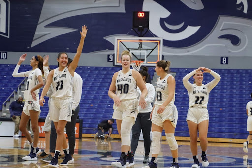 The lady Ospreys celebrate after their win against Trinity.