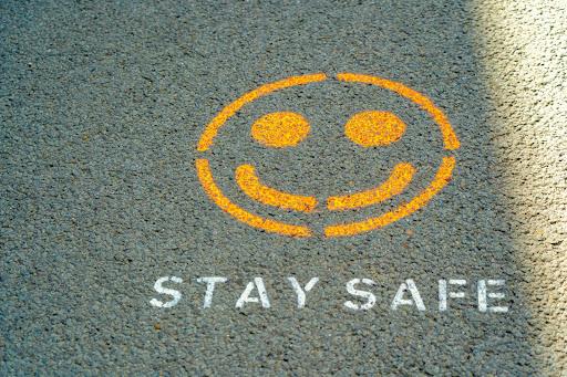 Stay safe. One of the many street signs that have appeared, to warn people, during the current pandemic. This one was in the high street of Shaftesbury, which has now been pedestrianised. Photo by Nick Fewings/Unsplash. 