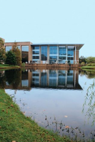 A view across the small lake in front of the Thomas G. Carpenter Library.