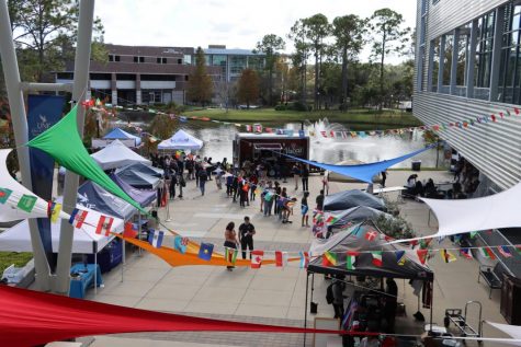 Banners and flags adorn the University of North Florida John A. Delaney Student Union during the 2021 World Fest Village Market Day.