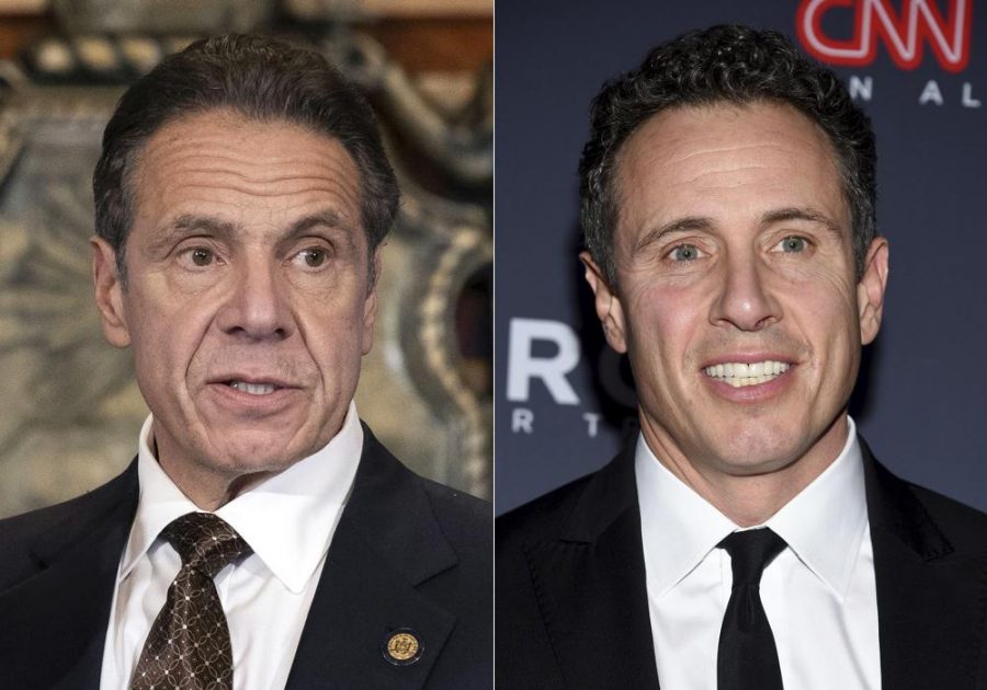 In this combination of photos New York Gov. Andrew Cuomo, left, appears during a news conference about COVID-19 at the State Capitol in Albany, N.Y., on Dec. 3, 2020, and his brother CNN anchor Chris Cuomo attends the 12th annual CNN Heroes: An All-Star Tribute at the American Museum of Natural History in New York on Dec. 9, 2018. CNN said Tuesday, Nov. 30, 2021, it was suspending Chris Cuomo indefinitely after details emerged about how he helped his brother, as he faced charges of sexual harassment.(Mike Groll/Office of Governor of Andrew M. Cuomo via AP, left, and Evan Agostini/Invision/AP, File)