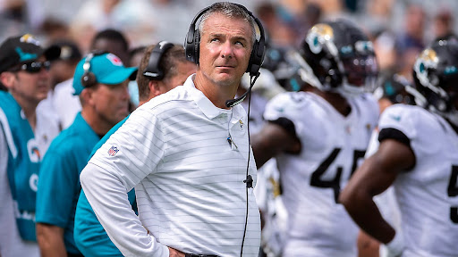 Jacksonville Jaguars head coach Urban Meyer watches a play on the video monitor during the second half of an NFL football game against the Denver Broncos, Sunday, Sept. 19, 2021, in Jacksonville, Fla. (AP Photo/Stephen B. Morton)