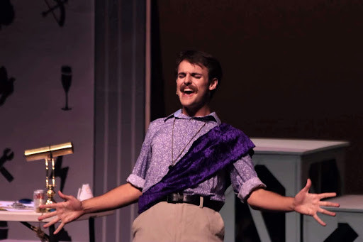 Mr. D (Joshua Benet) screams at the gods in anguish during the UNF Swoop Troupe’s performance of The Lightning Thief in Jacksonville, Florida, Friday, Feb. 11.