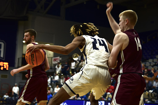 UNF forward Jadyn Parker (24) goes to work in the post against Bellarmine on Wednesday.