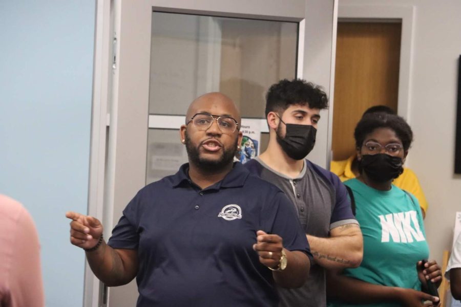 UNF Black Alumni Association Advisory Council President Brandon Jacobs speaks to the group