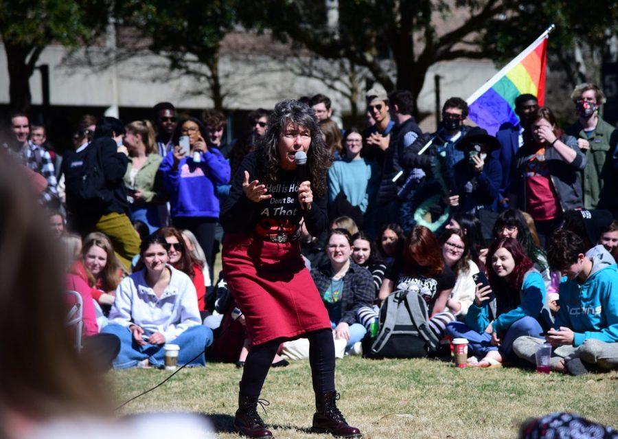 Sister Cindy preaches against a backdrop of students on the University of North Florida Green Valentine’s Day afternoon in Jacksonville, Florida, Monday, Feb. 14. 