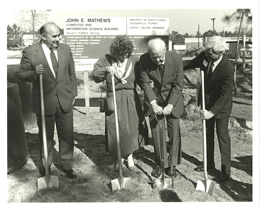 John Matthews Jr. (center right) breaking the ground for his namesake computing building, fittingly held on March 14, 1987 (Pi Day), courtesy of UNF Digital Commons.