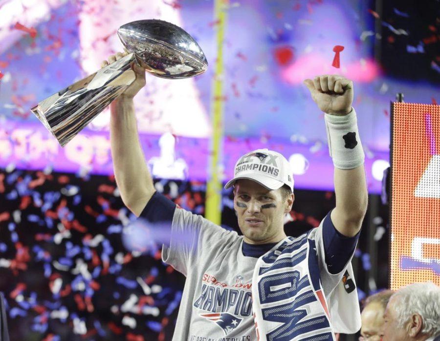 New England Patriots quarterback Tom Brady celebrates with the Vince Lombardi Trophy after the NFL Super Bowl XLIX football game against the Seattle Seahawks Sunday, Feb. 1, 2015, in Glendale, Ariz. The Patriots won 28-24. Tom Brady has retired after winning seven Super Bowls and setting numerous passing records in an unprecedented 22-year-career. He made the announcement, Tuesday, Feb. 1, 2022, in a long post on Instagram. 