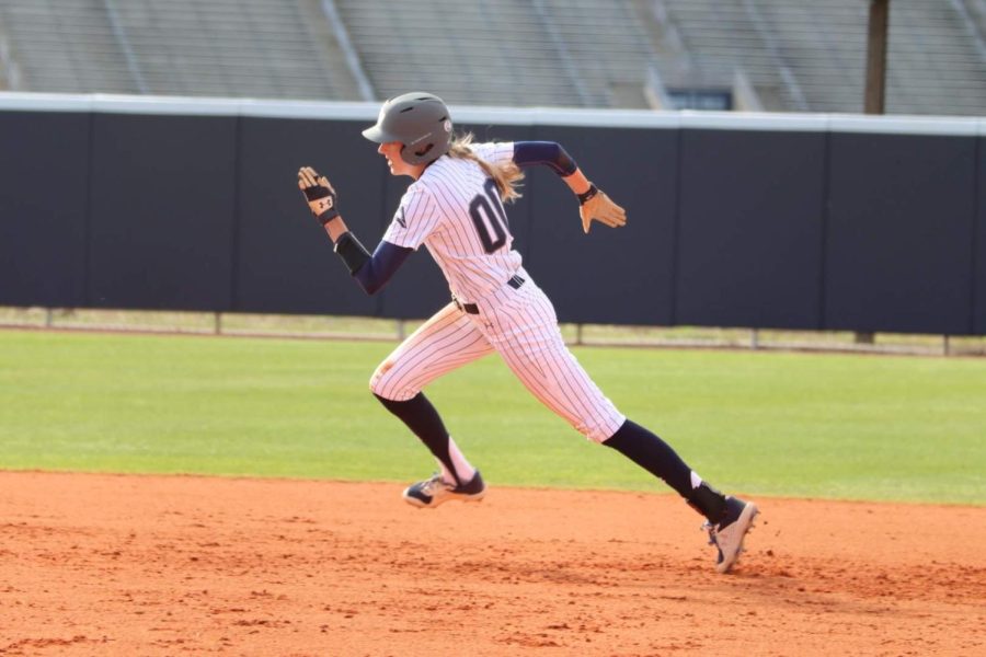 Maggie Trgo #00 running to third after a base hit against Bucknell at UNF Softball Complex on March 16, 2022 in Jacksonville, Florida.