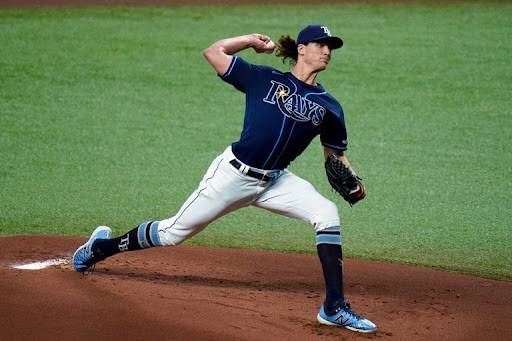 Tampa Bay Rays starting pitcher Tyler Glasnow (20) delivers to the Baltimore Orioles during the first inning of a baseball game Tuesday, Aug. 25, 2020 in St. Petersburg, Fla. (AP Photo/Chris O’Meara)