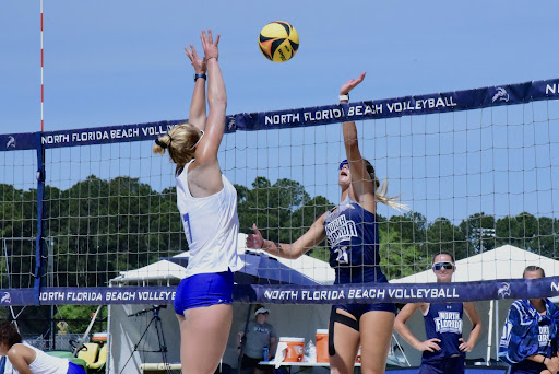 A showdown takes place at the net, with UNF’s Chantel McMillan and Georgia State’s Chloee Keespies dueling for a point.