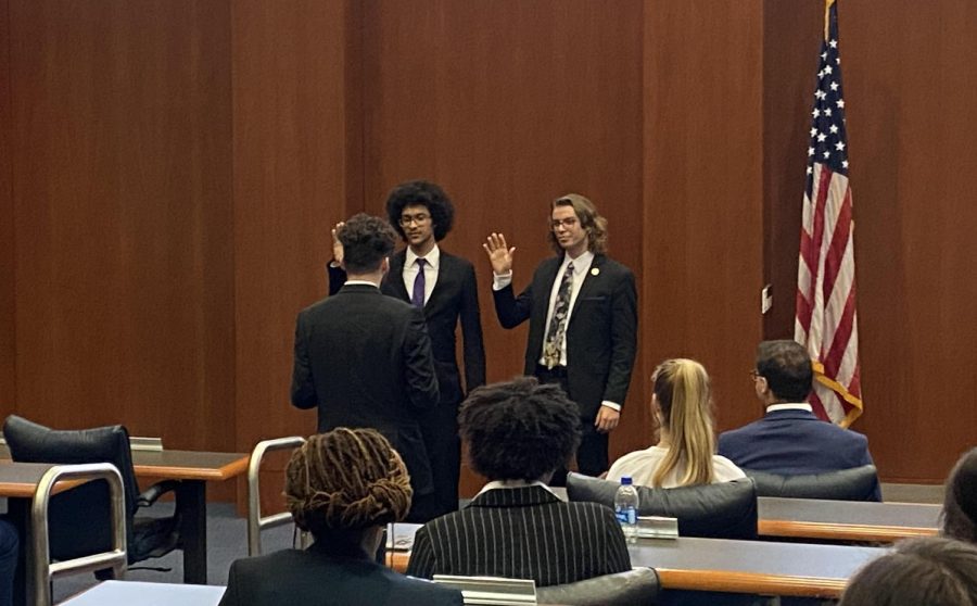 Nathaniel Rodefer and Joshua Murry being sworn in by Chief Justice Travis Ford on April 15, 2022.