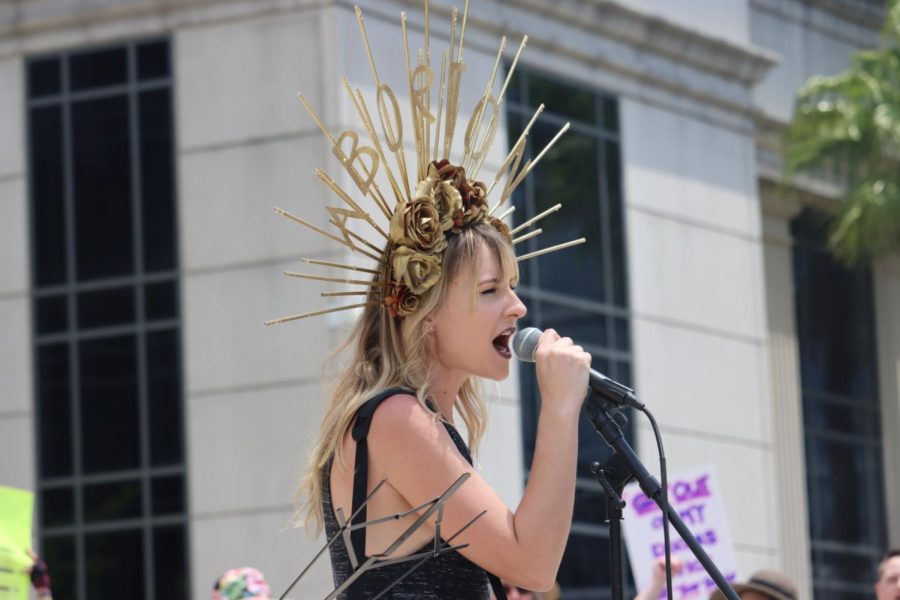 A protestor speaks into a microphone at “The People’s Abortion Rally” for abortion rights in front of the Duval County Courthouse in Jacksonville on Saturday, May 14, 2022. 