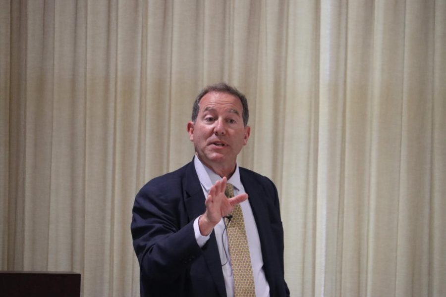 Presidential Candidate Marc Miller talks to staff members during a meet-and-greet meeting on Friday, April 29, 2022 in the Talon Room.