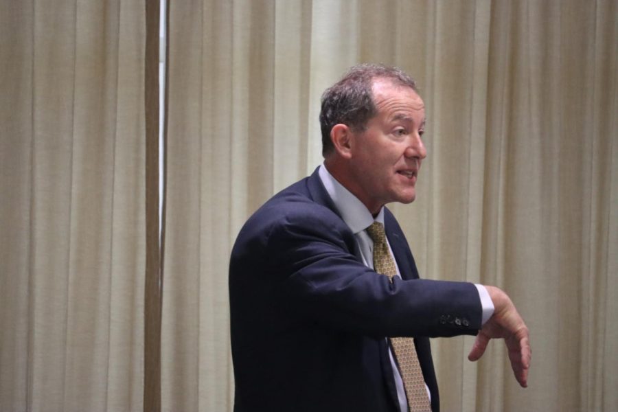 Presidential Candidate Marc Miller talks to staff members during a meet-and-greet meeting on Friday, April 29, 2022 in the Talon Room.