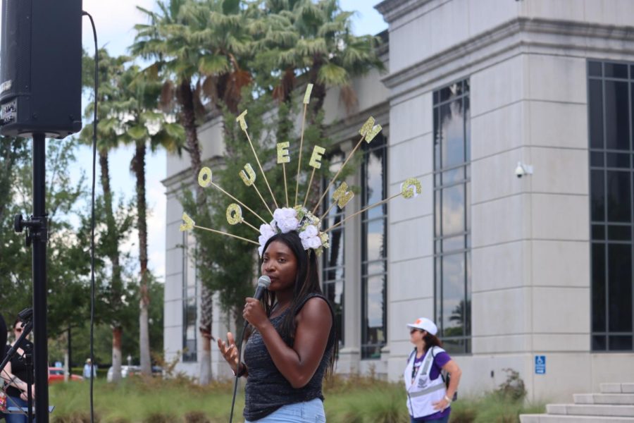 A protestor speaks into a microphone at “The People’s Abortion Rally” for abortion rights in front of the Duval County Courthouse