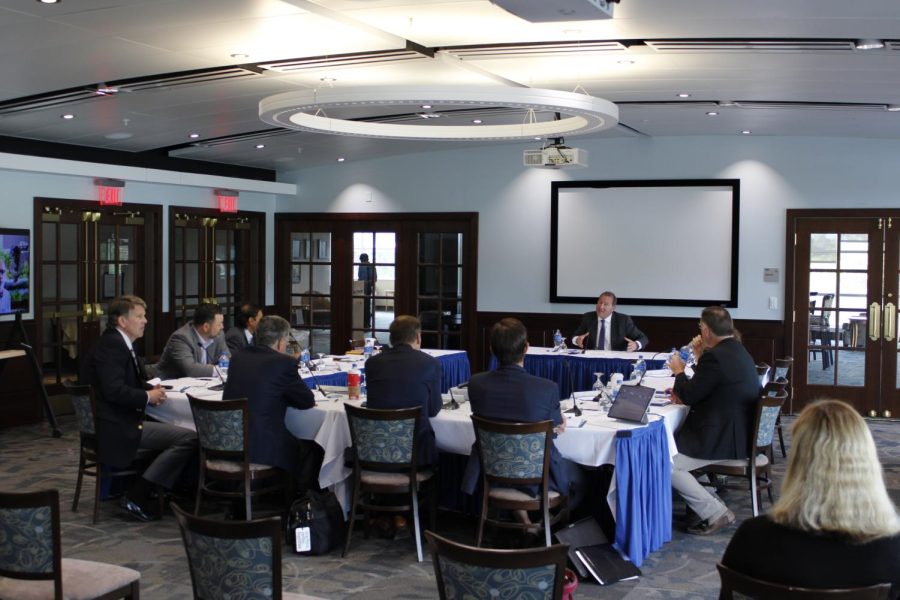 Marc Miller gestures as he talks to the University of North Florida Board of Trustees during his final interview