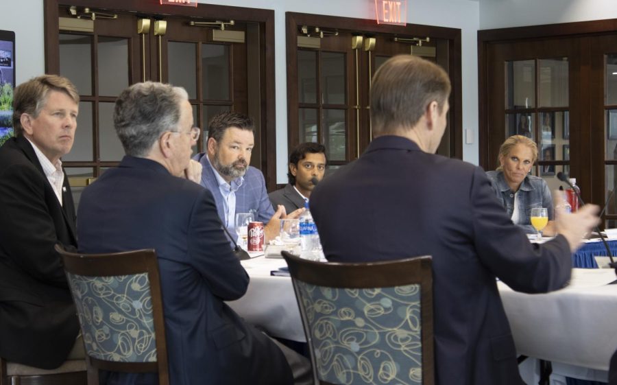 The University of North Florida Board of Trustees debates after finishing their four presidential candidate interviews