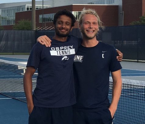 Deshmukh and Von Winning stand side by side on a tennis court