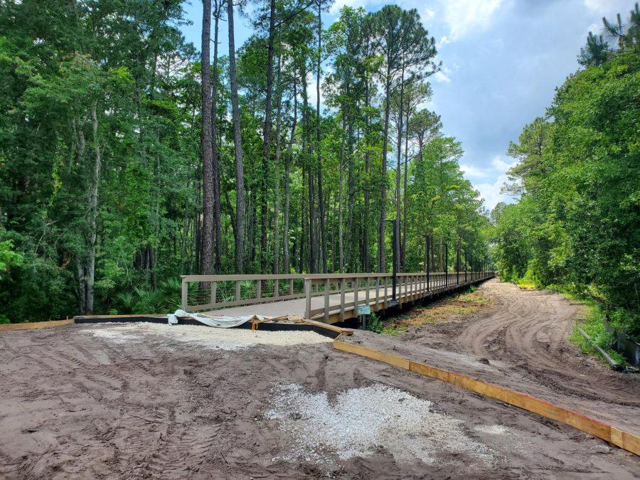 The new walkway will open out toward Lot 14 and is set to finish construction by the end of the summer semester