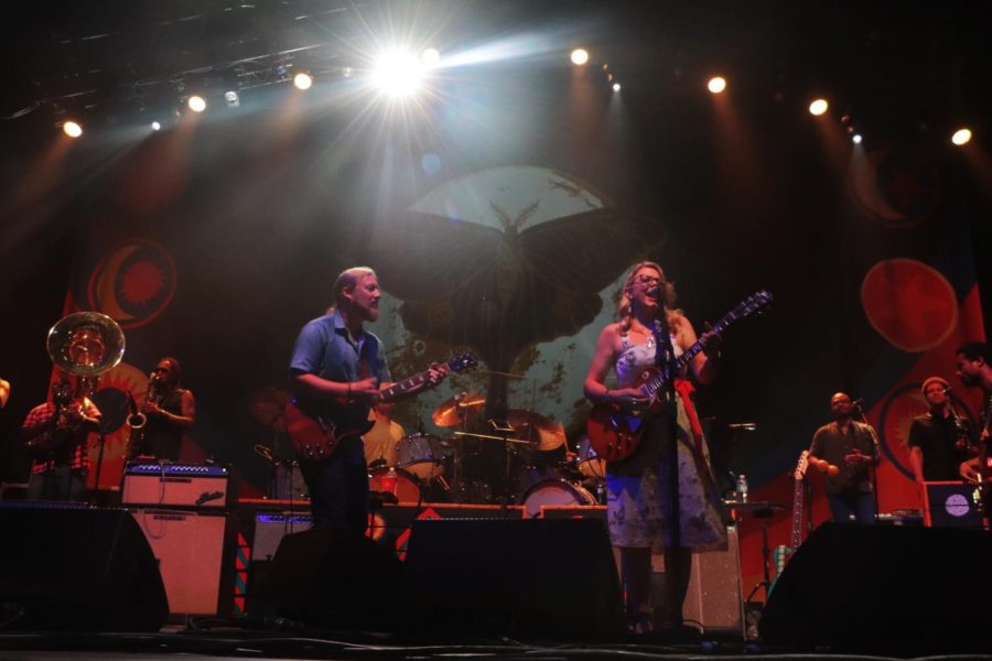 The Tedeschi Trucks Band play instruments and sing