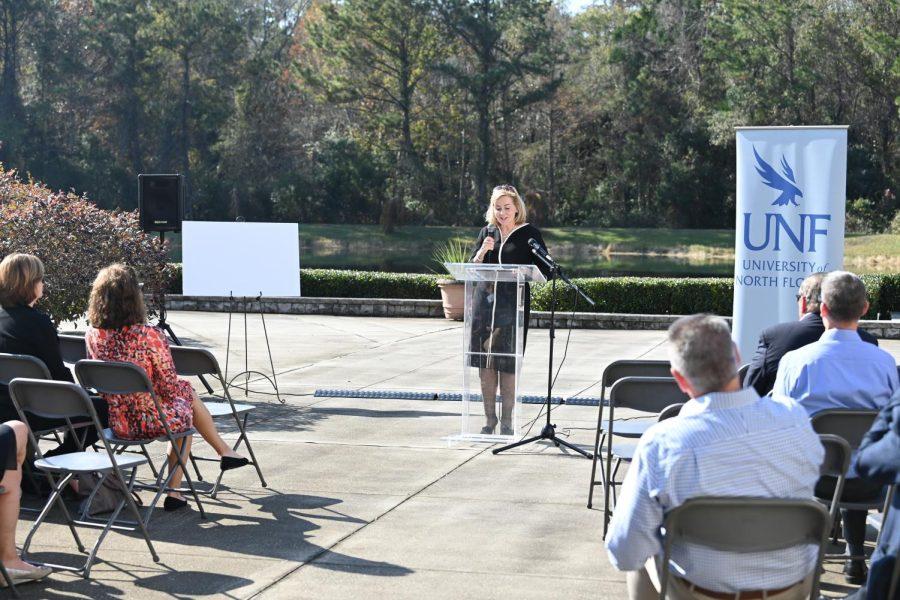 Chally speaks to a crowd during a meeting announcing the donation of 190 acres of land to UNF