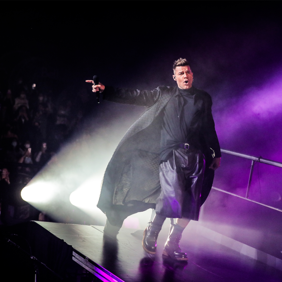 Ricky Martin points out at the crowd during a live performance