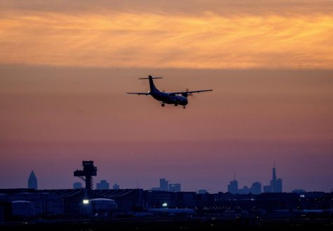 An aircraft lands at the international airport in Frankfurt, Germany