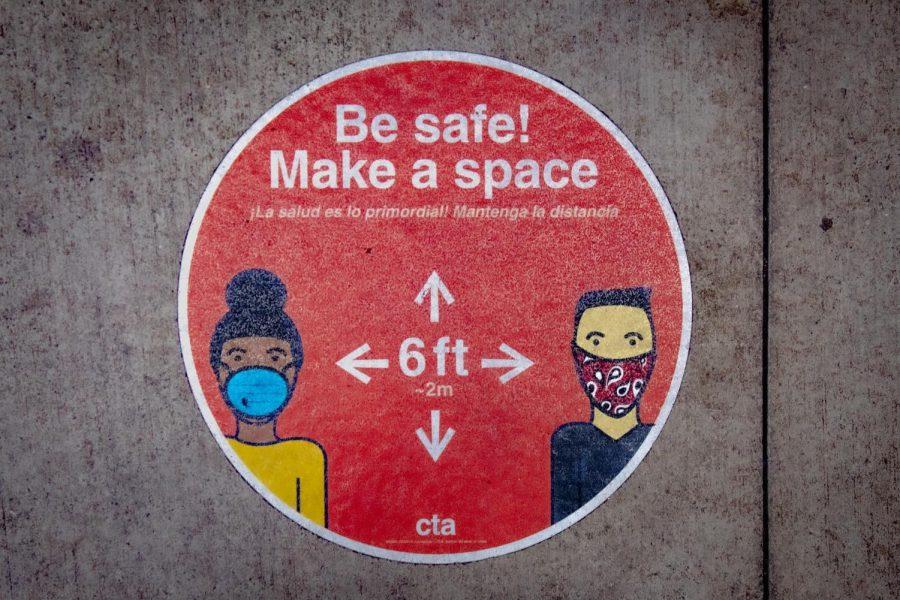 A social distancing sign telling people to be safe! make space