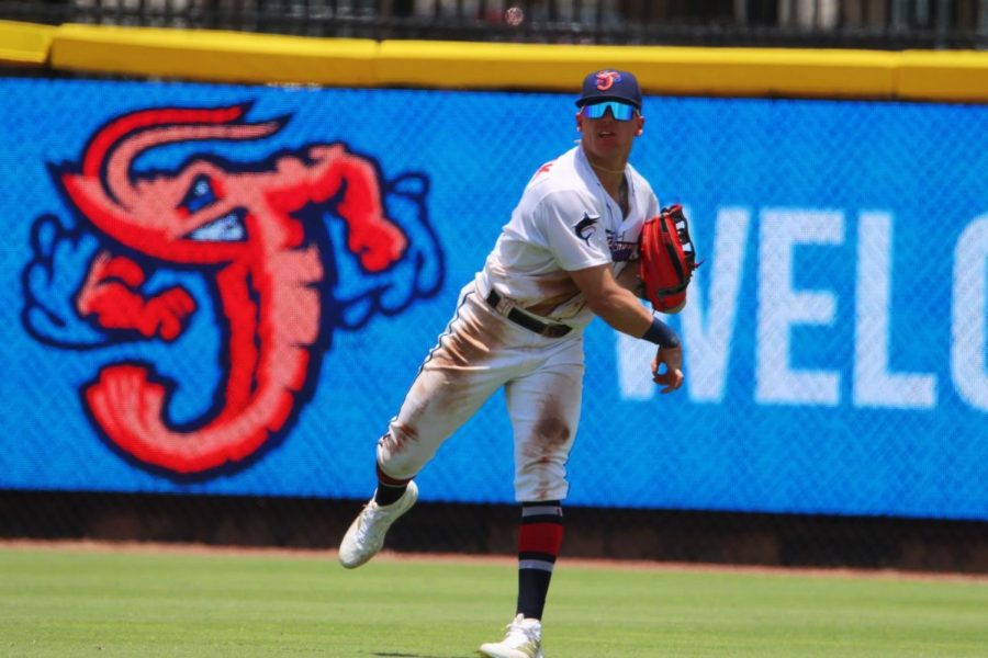 Jumbo Shrimp outfielder throws a ball