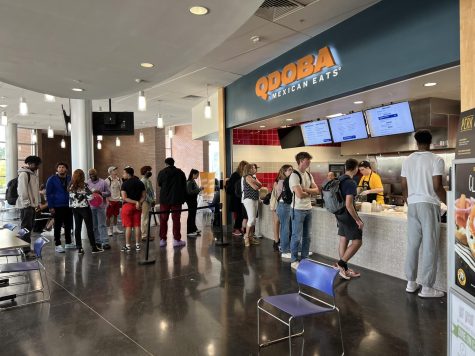 Students stand in line for Qdoba