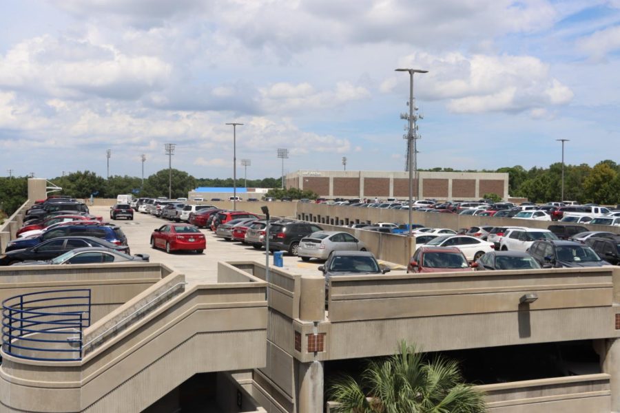 Rows of cars on top of the Arena Parking Garage