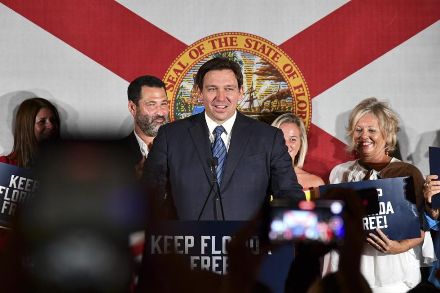 DeSantis speaks on a podium