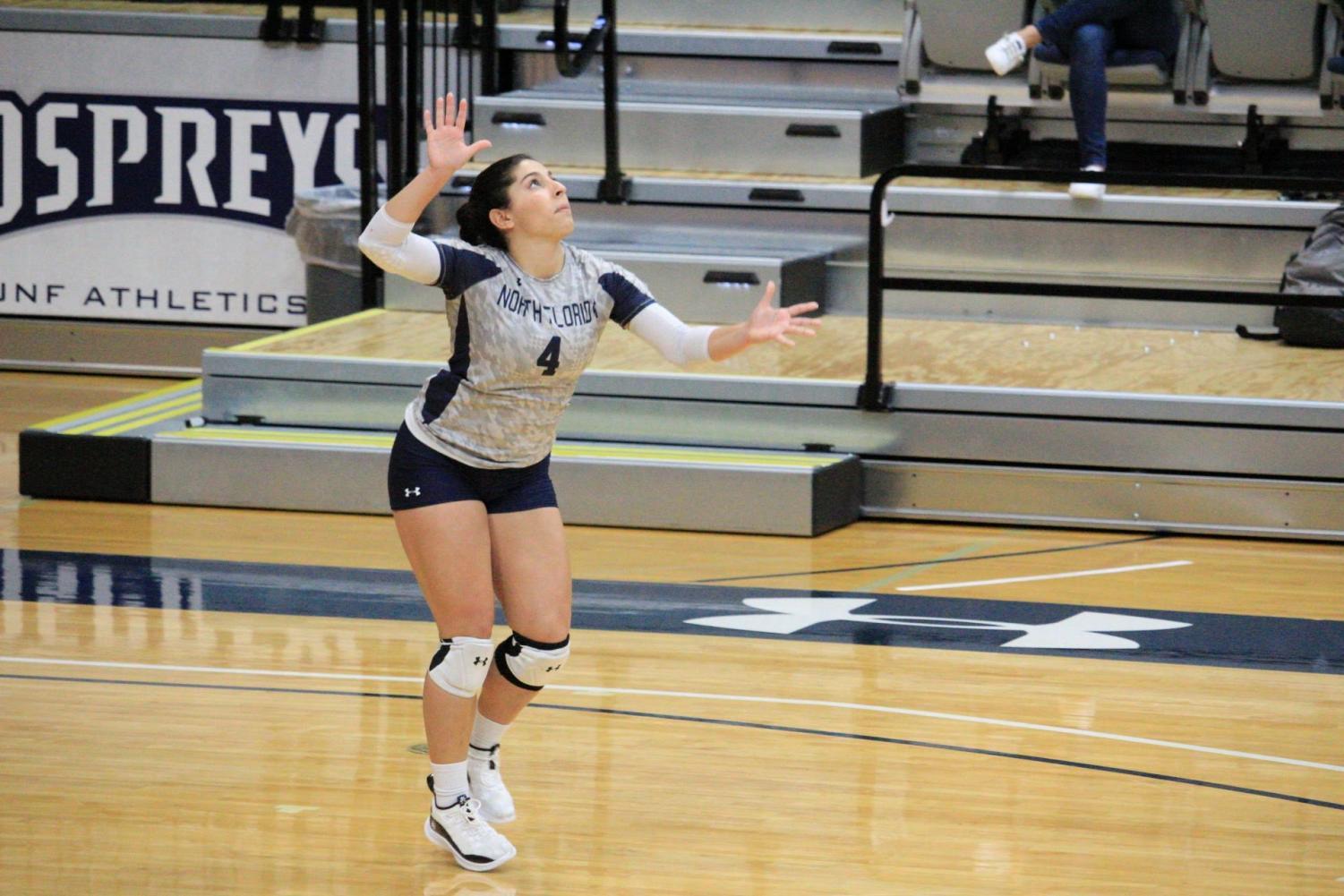 Volleyball player prepares to hit the ball.