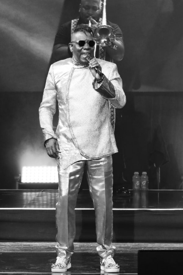 Black and white photo of a singer performing on stage