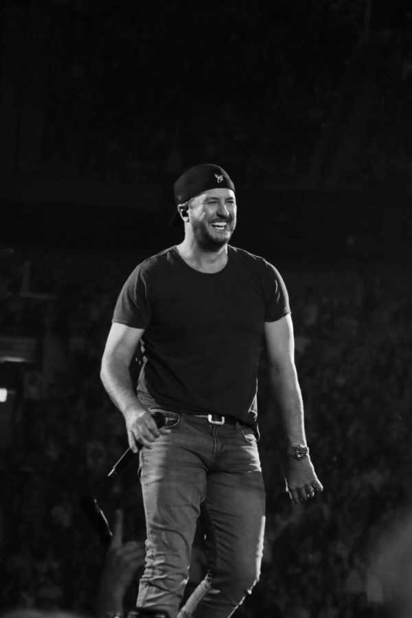 Luke Bryan smiles in this black and white photo