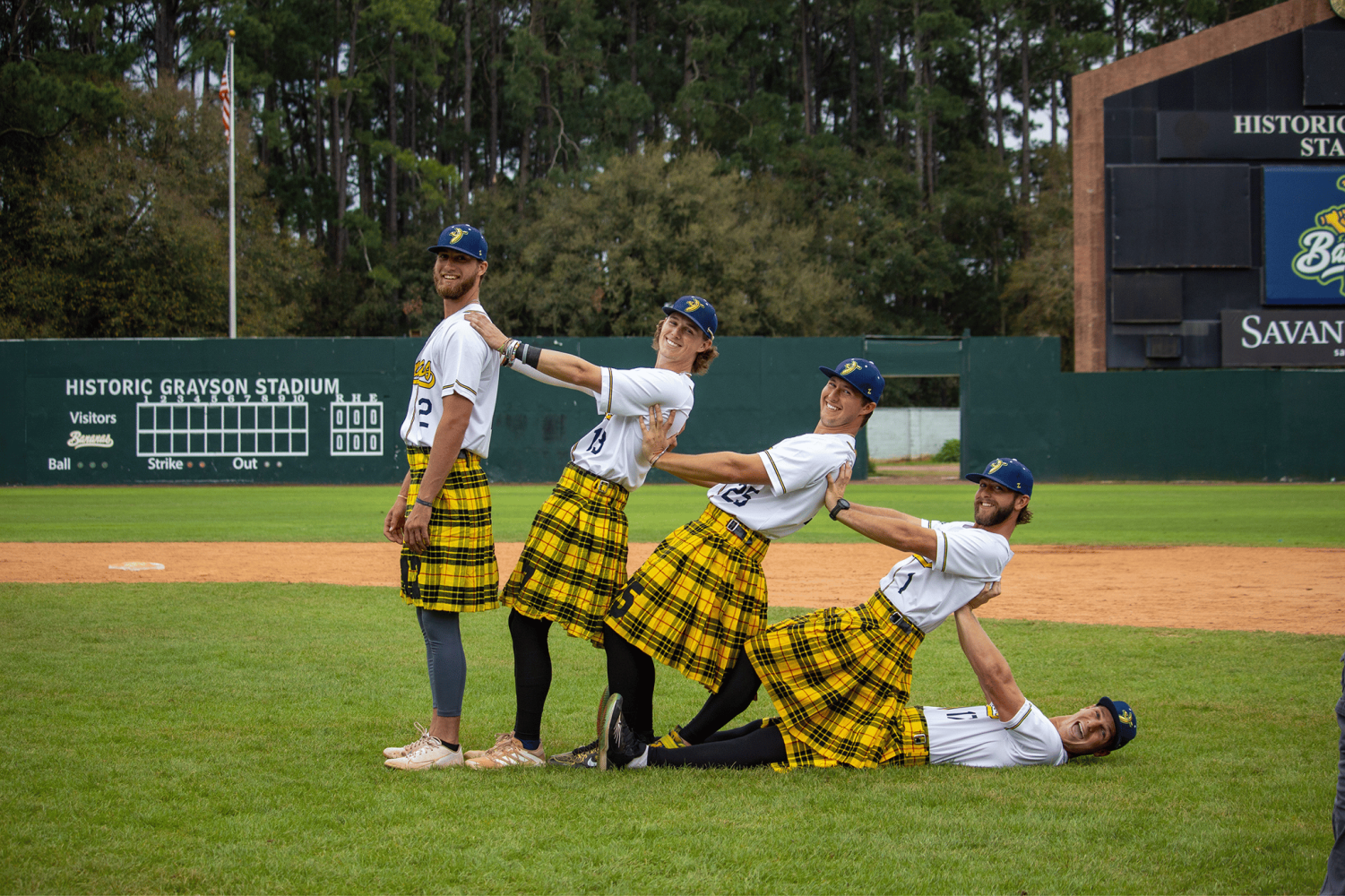 Bananas players pose for photo wearing kilts