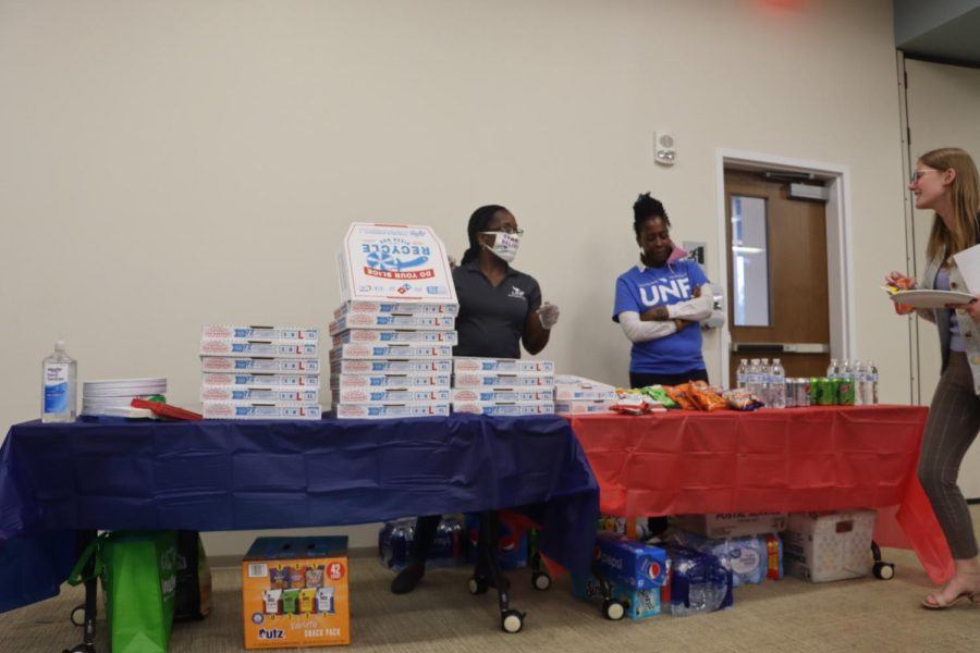 Pizza stacked on a table