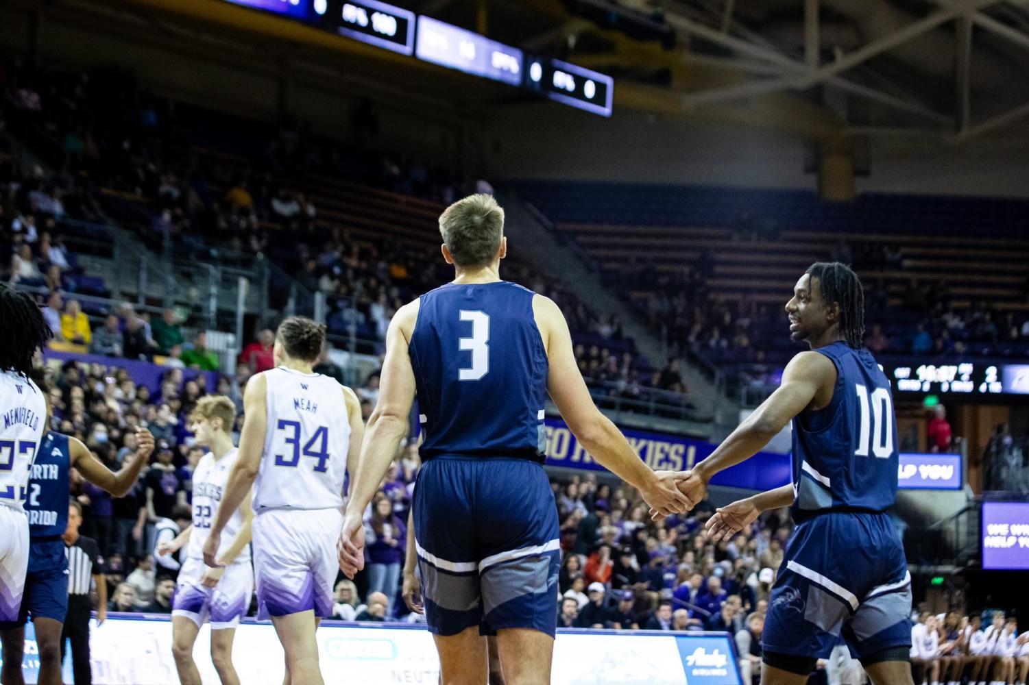 Players high-five each other