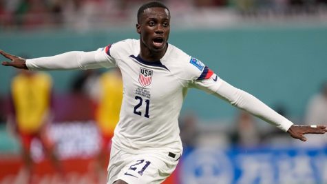 Tim Weah celebrates following opening goal of USMNT's World Cup experience