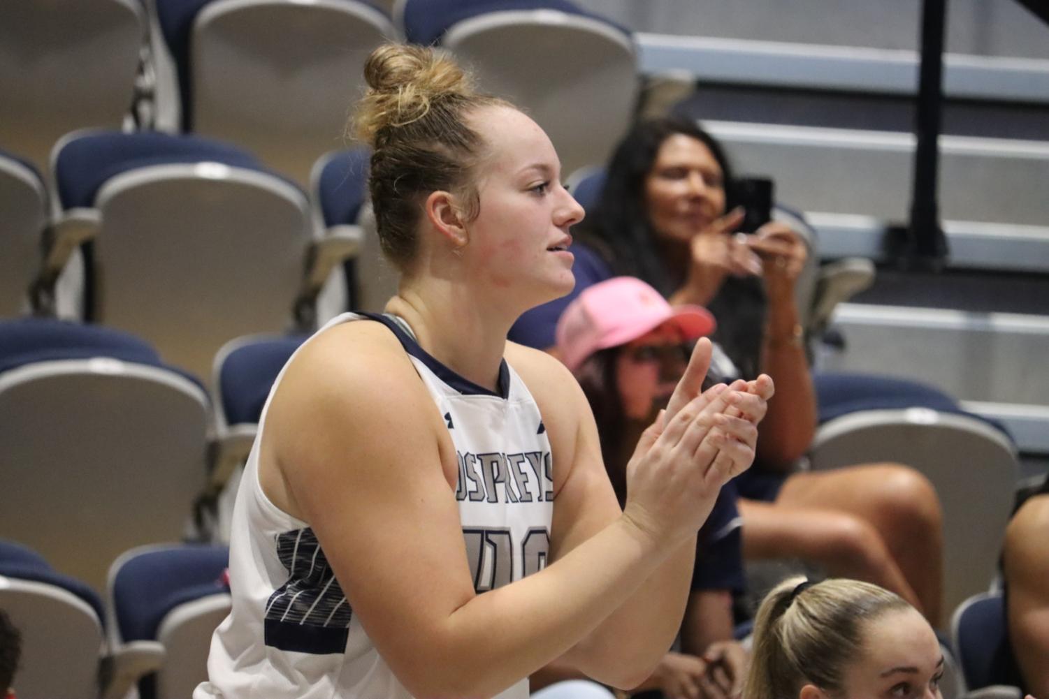 Emma Broermann cheers on her team.