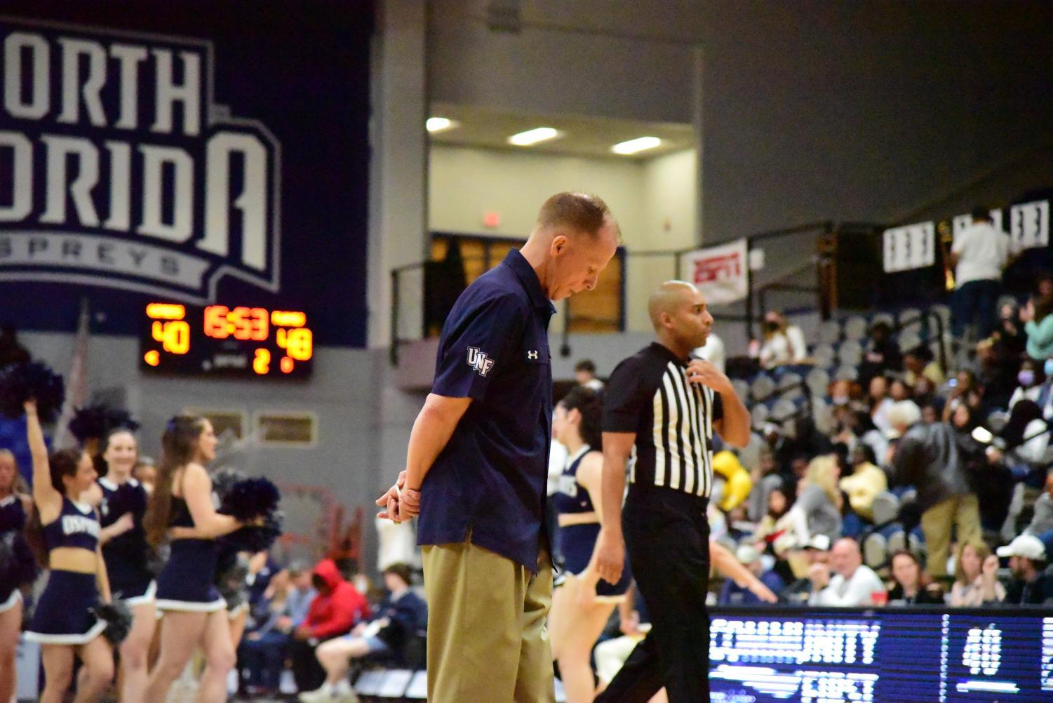 Coach Driscoll collects his thoughts during timeout